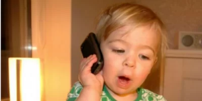 A child dials 911 seeking assistance from police officer.