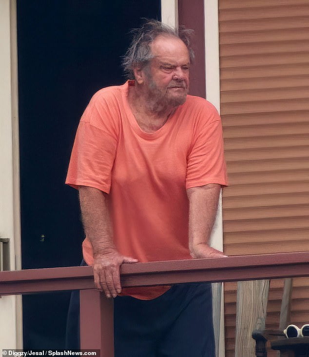 In video exclusively obtained by DailyMail.com, birds could be heard chirping as Nicholson tapped on his balcony railings